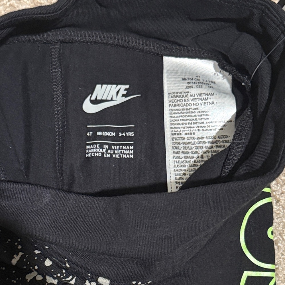 Nike Kids Black Leggings with White Speckles and Neon Green Logo - Picture 3 of 5